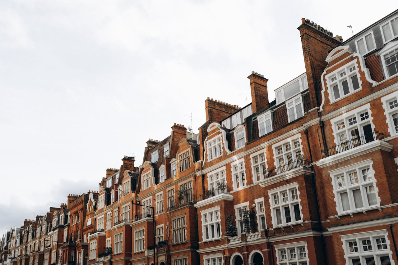 British terraced houses exterior, classic UK residential street, UK property buying guide